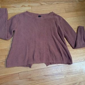 Nude sweater with lace-up back